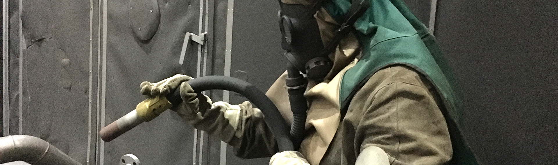 Ferrous metal blast cleaning